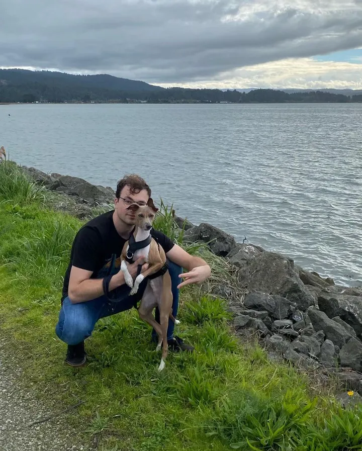 A man and his puppy